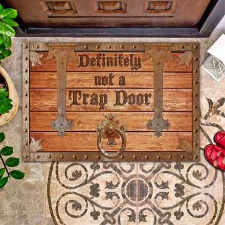 This 'Definitely Not A Trap Door' Doormat Is Perfect For Prankster Homeowners