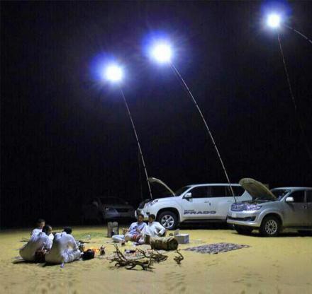 This Giant Telescoping Outdoor Lamp Attaches To Car Battery, Perfect For Night Games, Emergencies