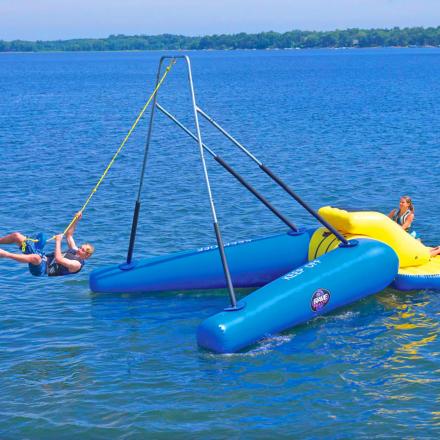 This Inflatable Floating Rope Swing Is a Must For Lake Property Owners