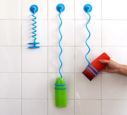The Bungee Bath Is A Bungee Cord That Holds Your Shower Bottles