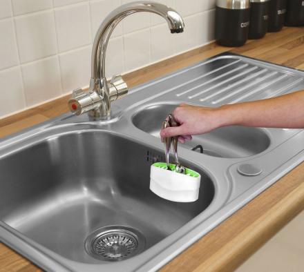 The Cutlery Cleaner Attaches To Your Sink To Easily Clean Your Silverware