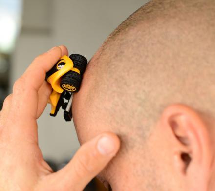The HeadBlade Is a Toy Car Head Shaver