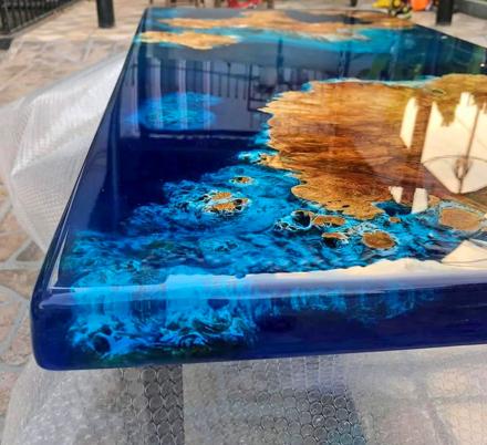 This Blue River Epoxy Table Is Made To Look Like a Satellite View Of Earth
