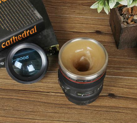 This Camera Lens Coffee Mug Stirs Itself