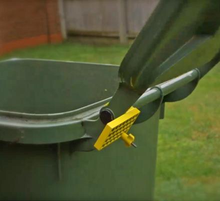 This Genius Garbage Can Lid Assist Stops The Trash Lid From Slamming Backwards