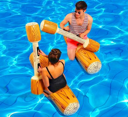 This Inflatable Log Gladiator Game Lets You Battle Your Friends In The Pool