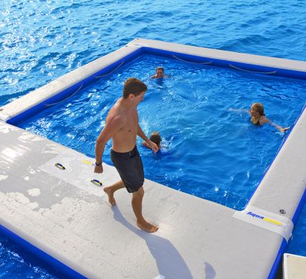 These Inflatable Ocean Pools Give You A Closed-Off Swimming Area In a Lake Or Ocean