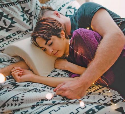 This Curved Pillow Lets You Cuddle Without Turning Your Arm Numb