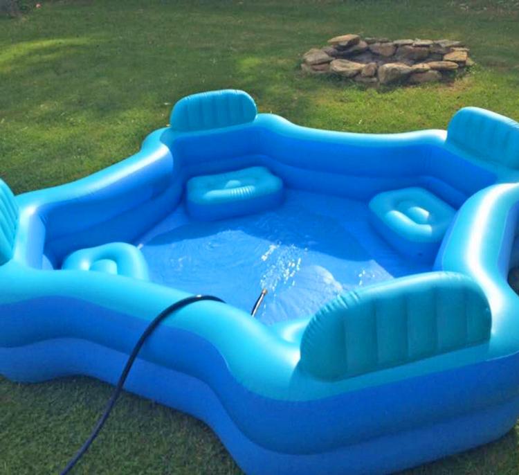 An Inflatable Lounge Chair Pool For Four People