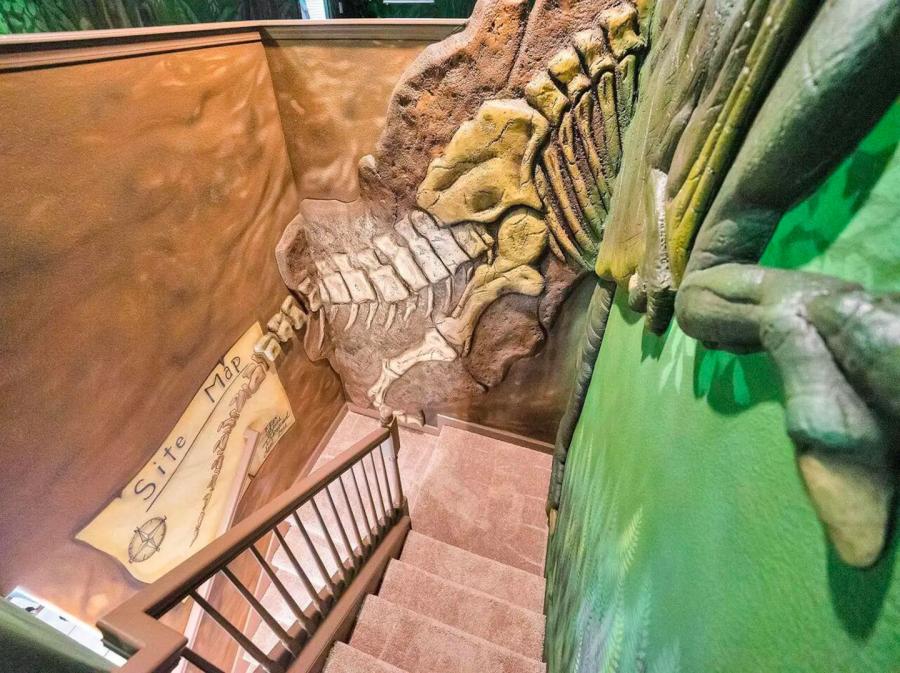 Dino-Themed Airbnb With Giant Dinosaur Beds - Dinosaur vacation rental home