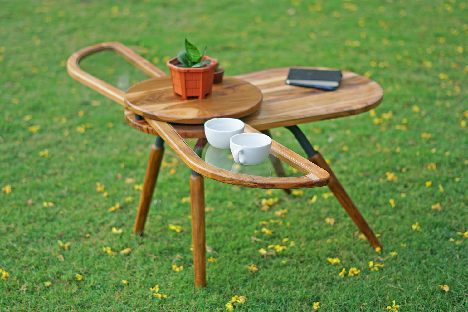 Beetle Inspired Coffee Table Has Wings That Spread Out To Increase Surface Area - Elytra extending coffee table