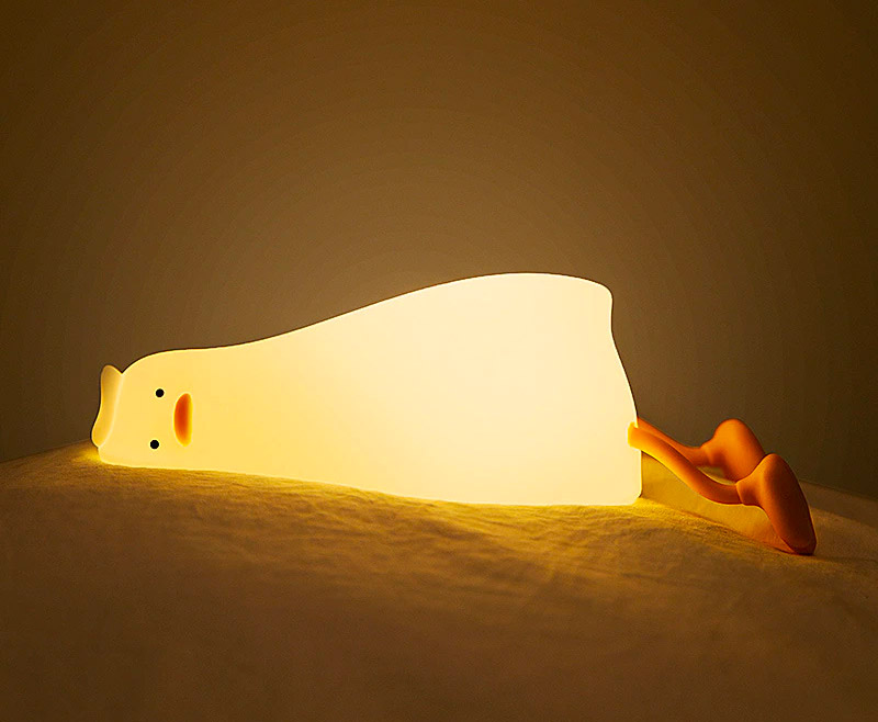 Funny defeated duck lying on stomach night-light - duck in existential crisis lamp