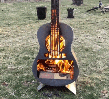 Guitar Fire Pit - Metal guitar shaped wood burning stove