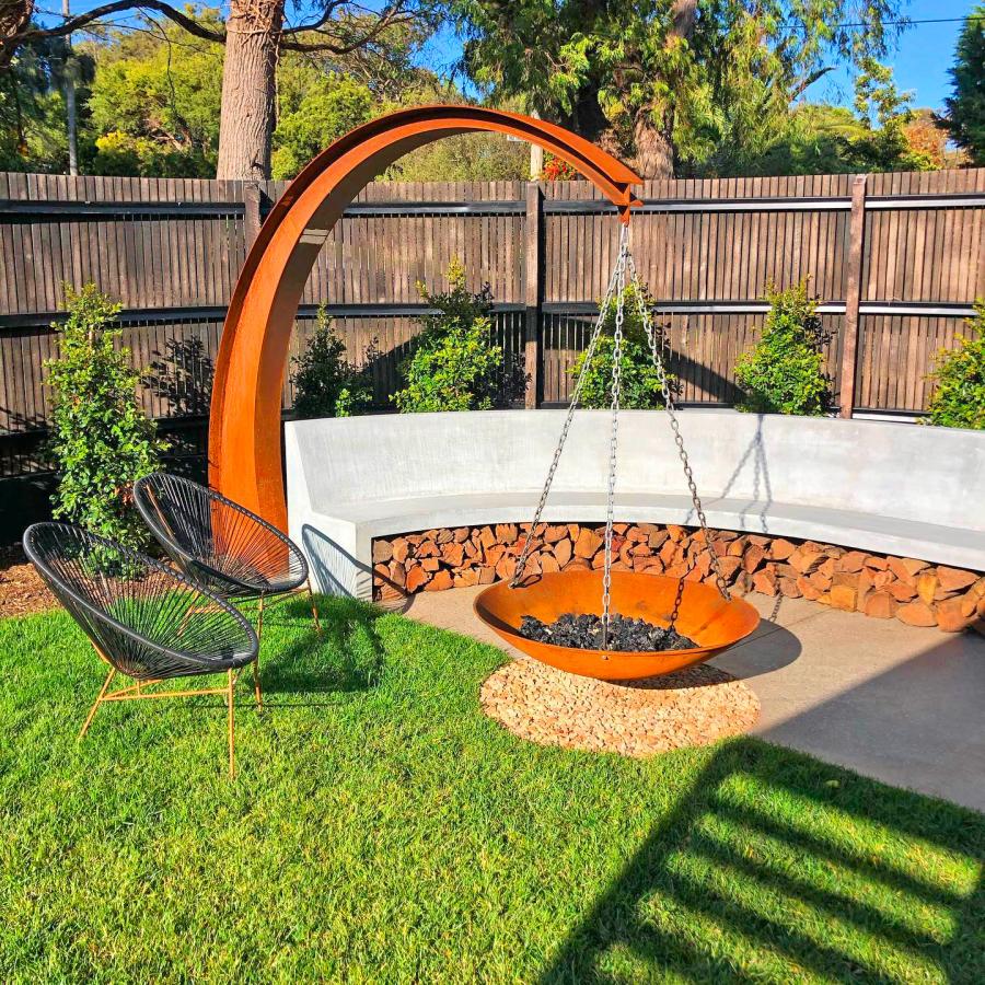 Hanging Fire Pit With Giant Arching Metal Support Beam By Matt Hill