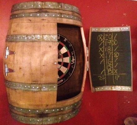 This Wine Barrel Dartboard Cabinet Was Made From a Repurposed Napa Valley Wine Barrel