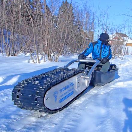 This All Terrain Electric Track Sled Can Transport Plow Move