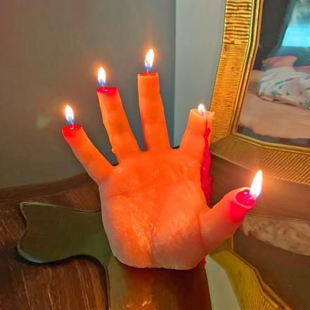 Hand candle on sale