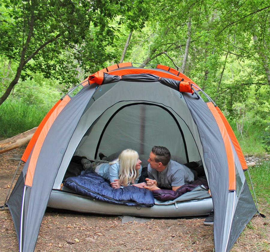 Camping Tent With An Inflatable Mattress Built In To The Bottom