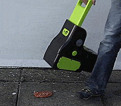 This DooUp Auto Pooper Scooper Cleans and Disinfects Area After Picking Up Your Dog's Poo