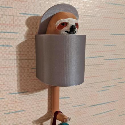This Extra Slow Rising Sloth Hook Is The Most Hilarious Way To Hang a Coat or Bag