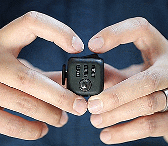 Fidget Cube: A Cube Shaped Toy Filled With Things To Fidget With