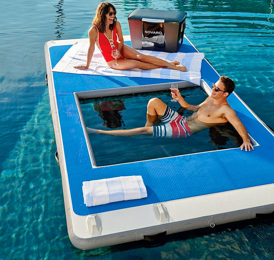 this floating island lake lounger with a built-in hammock