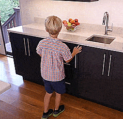 This Incredible Hideaway Step-Stool Pulls Out From The Cabinet