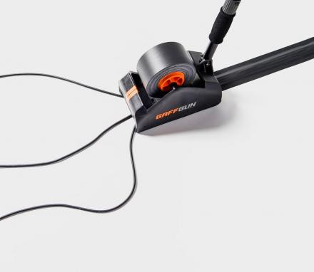Gaff Gun Automatically Tapes Down Cords To Your Floor