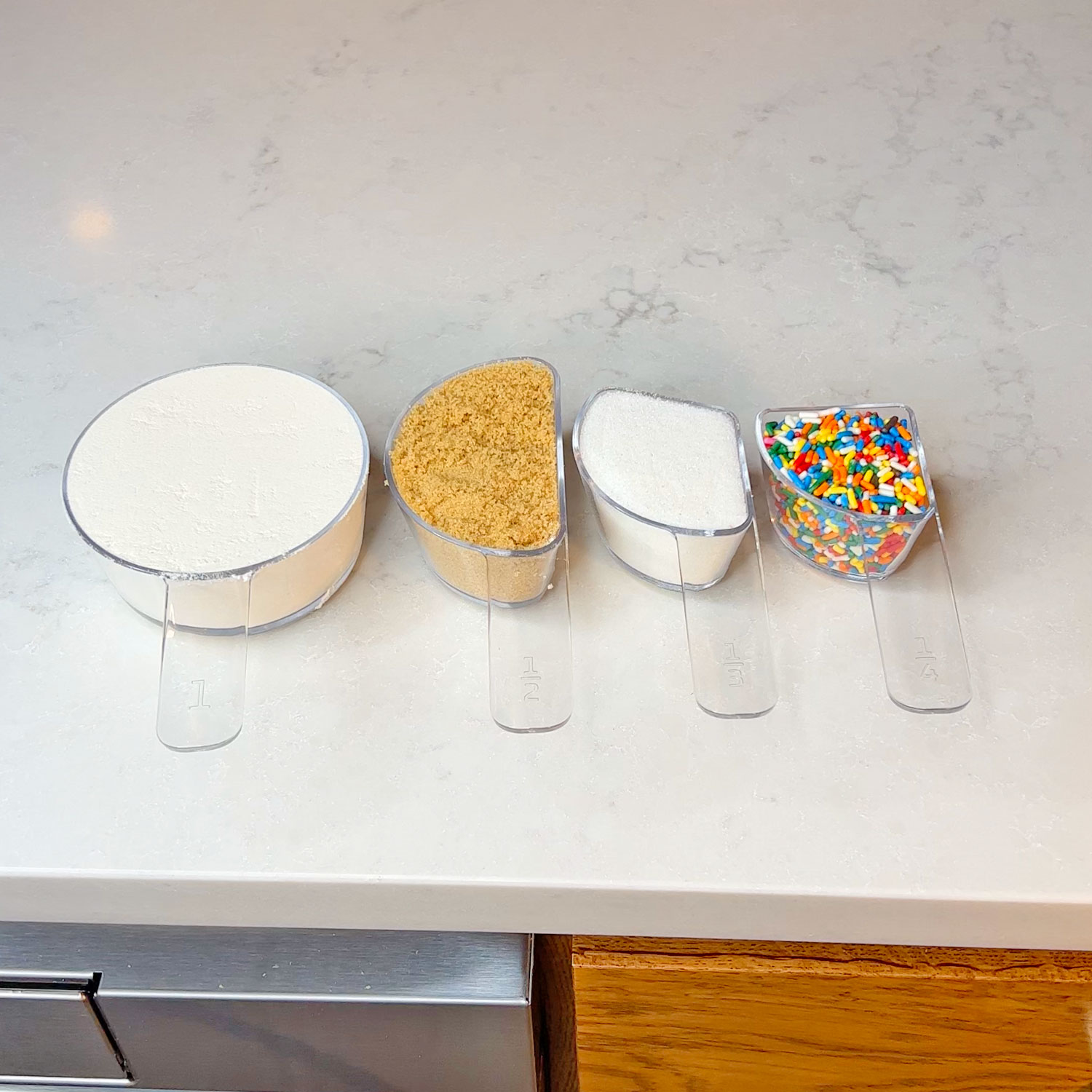 Genius  Finds: Visual Measuring Cups, Dishwasher Wine Glass Holder,  Clean/Dirty Magnet