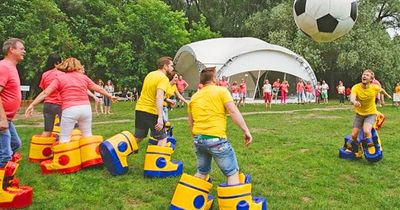 These Giant Inflatable Bouncy Shoes Will Make Giant Soccer Games Extra Fun