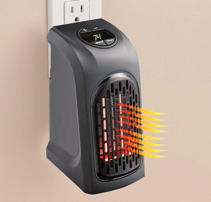 Handy Heater A Mini Portable Heater That Attaches To Any Outlet