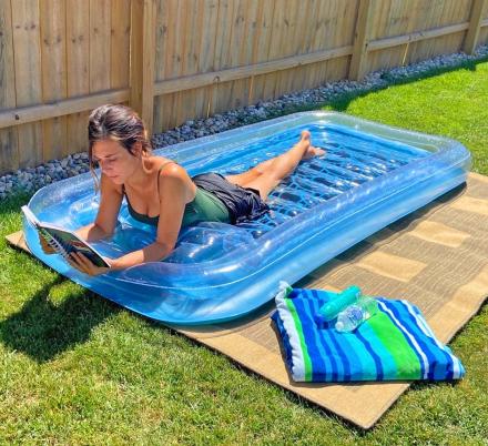 This Inflatable Sunbathing Pool Lounger Doubles as a Mini Pool