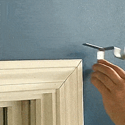 These Genius Tap-In Curtain Rod Holders Install In Just Seconds