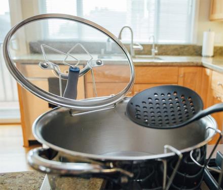 LidSitter Allows You To Hang Pot Lids and Ladles Right On Your Pot