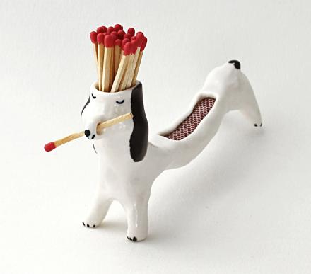 Matchstick Dog Holds Your Matches and Allows You To Strike Them On Its Back