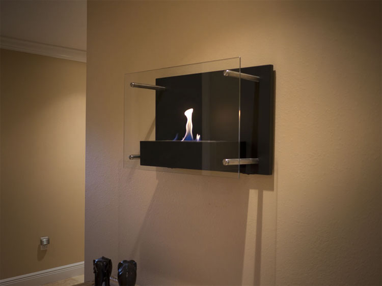 Why go to all that trouble installing a full sized fireplace in your house when you could just smash a hole in your wall and throw in a wall mounted fireplace