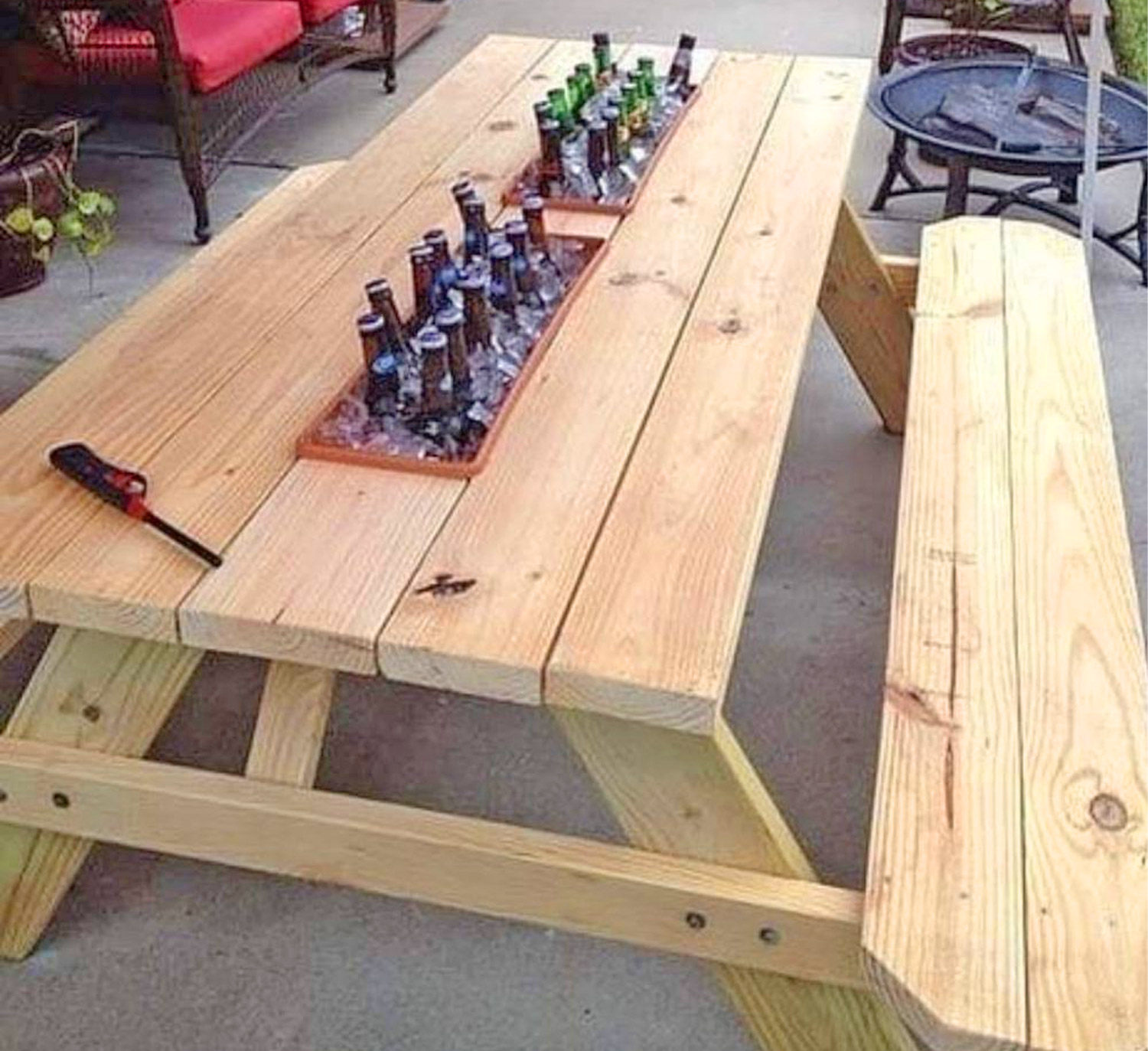 People Are Now Adding Drink Cooler Troughs To Their Picnic Tables, And