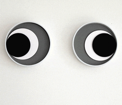 This Googly Eyes Wall Clock Uses Different Parts Of a Rotating Eye To Tell The Time