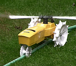 Raintrain Traveling Sprinkler Crawls Across Your Lawn While Watering Your Grass