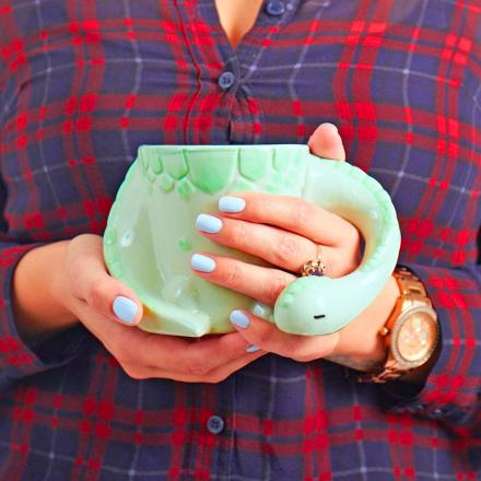 This Sleeping Dinosaur Mug Might Be The Cutest Way To Sip Your Morning Coffee