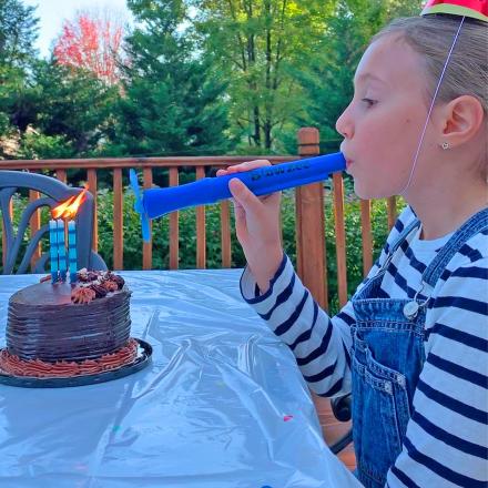 Someone Invented a Spit-Free Cake Candle Blowing Device To Spread Less Germs