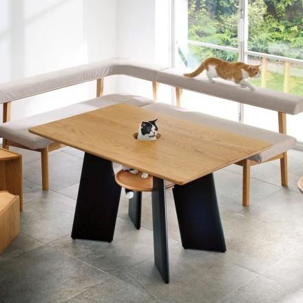 This Dining Table Has a Hole For Your Cat To Peak Through And Join You For Dinner