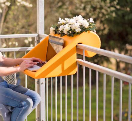 the balkonzept is an amazing work from home desk that connects to your balcony thumb