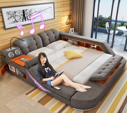 The Ultimate Bed With Integrated Massage Chair, Speakers, and Desk