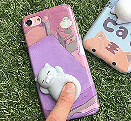 These iPhone Cases Have Soft Squishy Cats On The Back of Them