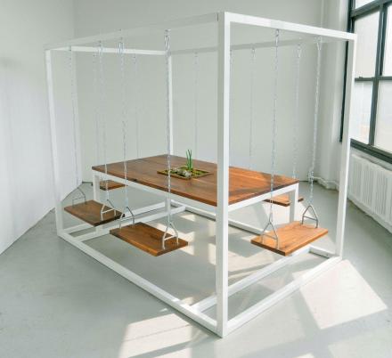 These Swing Tables Let You Swing While You Eat or Have a Meeting