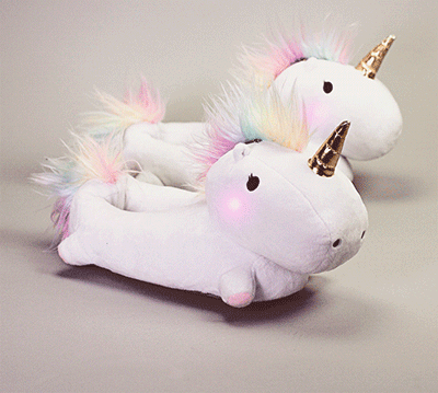 these unicorn slippers light up with magical colors with each step 0