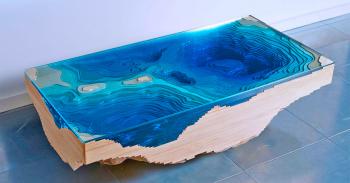 This Abyss Table Is Designed To Look Like The Sea Floor With a Topographical Design