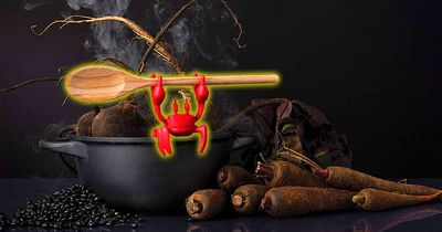 This Crab Cooking Helper Will Release Steam and Hold Your Spoon