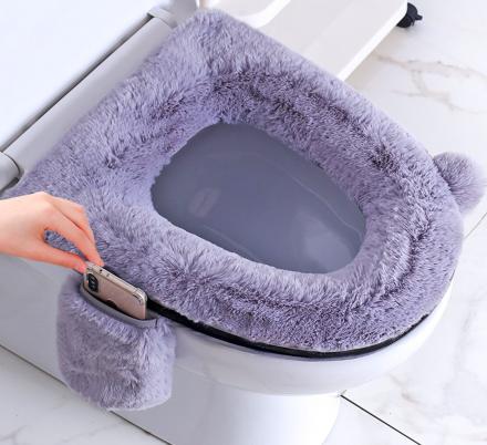 This Fluffy Toilet Seat Cover Comes Equipped With Its Own Phone Pocket